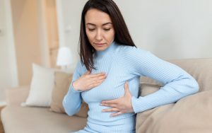 asian-woman-self-examining-breast