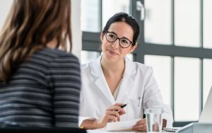 female-phsysician-listening-to-female-patient